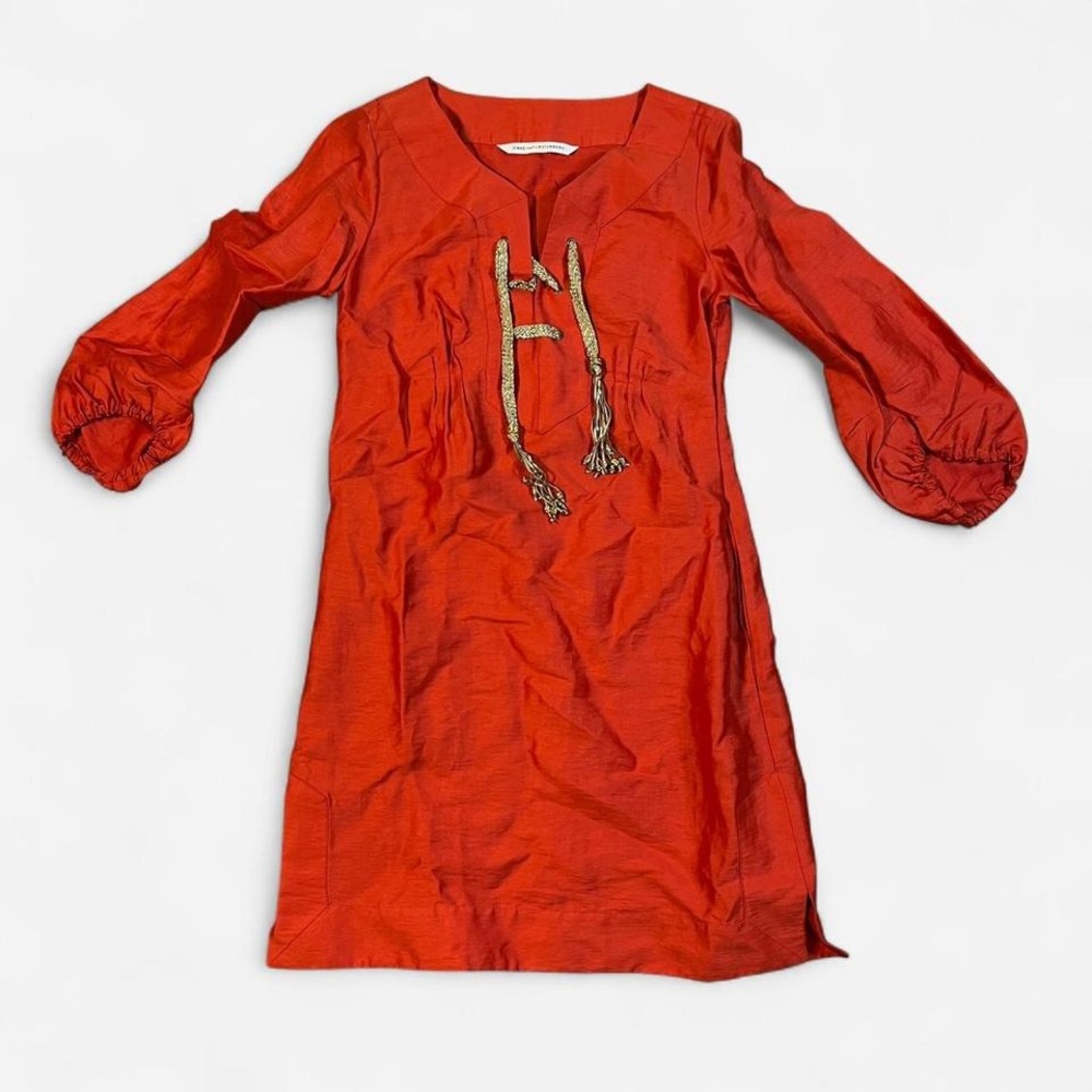 Red Diane von Furstenberg dress with gold lace up detail